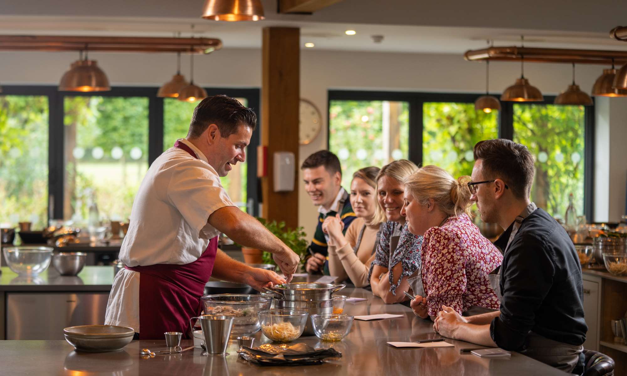 Chef performing cookery classes to students